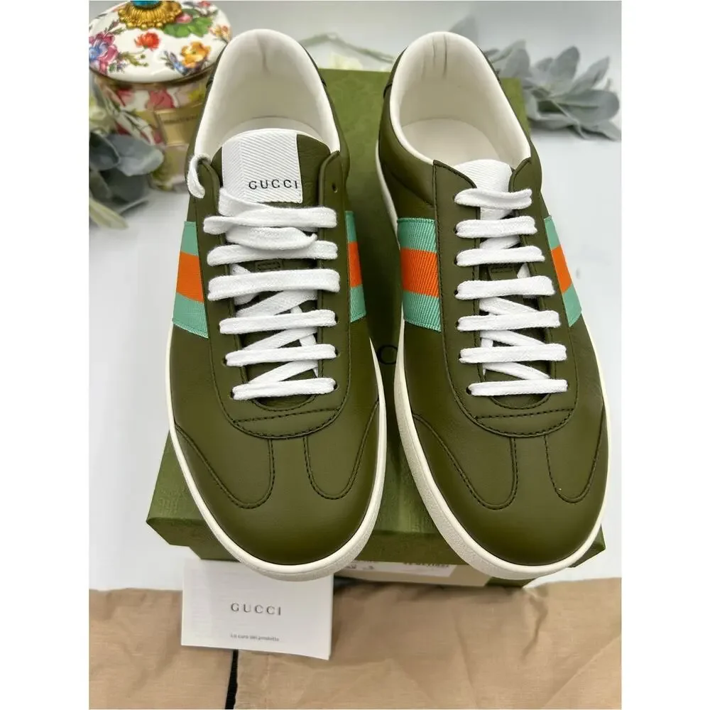 Men's Gucci, leather web design sneakers size 8 fits 8.5 US made in Italy